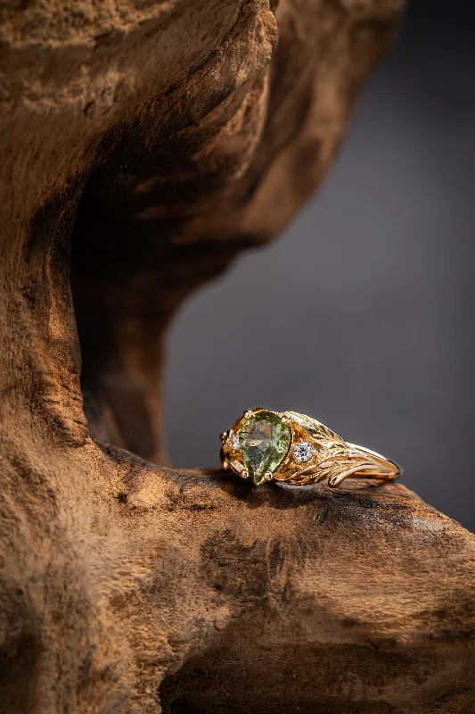 Gold leaf ring with one-of-kind rutilated green peridot and diamonds / Wisteria