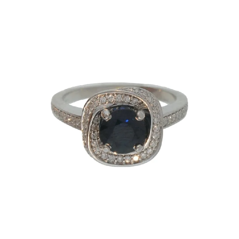 Blue Sapphire and Diamond Halo Ring